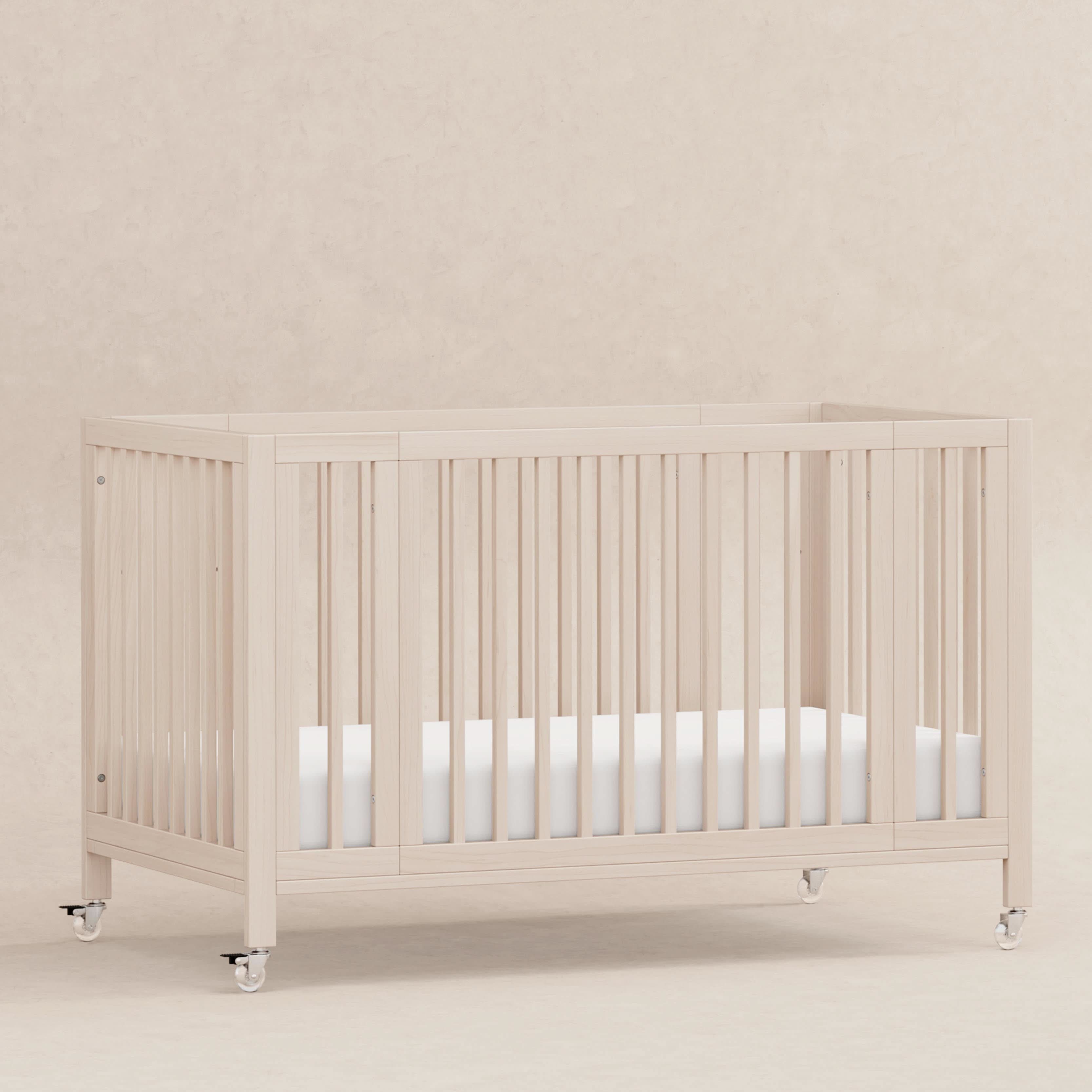 Babyletto Rolli 9-in-1 Convertible All-Stages® Crib with Bassinet & Toddler Bed Conversion Kits